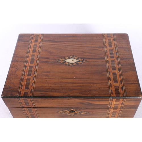 130 - Mother of pearl inlaid Turnbridge ware box, 25cm wide.