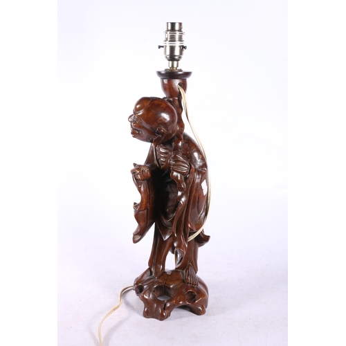 150 - Oriental table lamp in the form of a fisherman, 43cm.