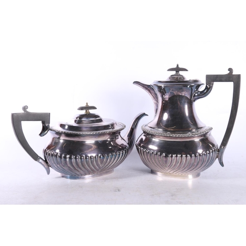 25 - Four piece EPNS half reeded teaset, and another teaset.