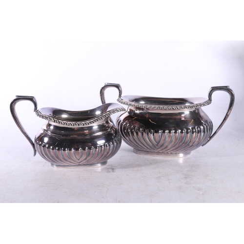 25 - Four piece EPNS half reeded teaset, and another teaset.