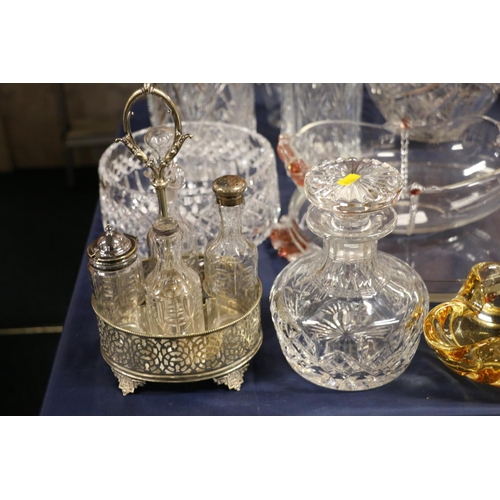 35 - Glass ware to include a large fruit basket, flower vases, cruets, coloured glass, etc.