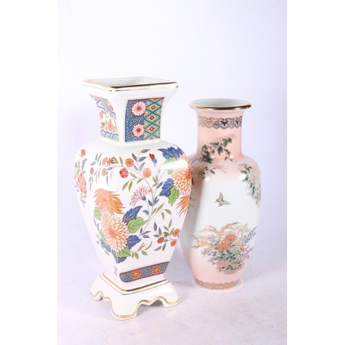 38 - Four modern oriental items to include two vases, a papier mache box, a coloured mask, etc.