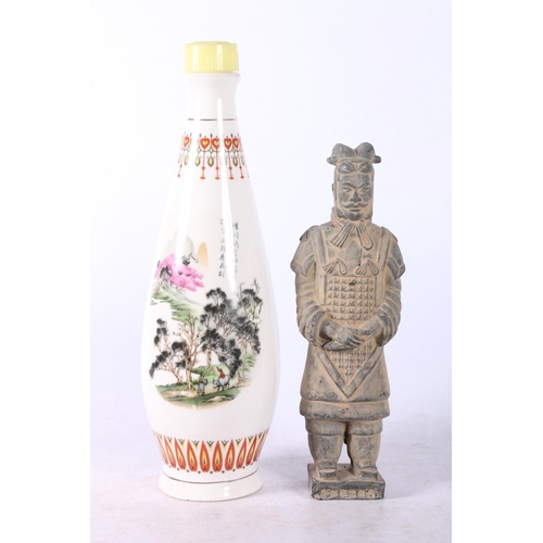 38 - Four modern oriental items to include two vases, a papier mache box, a coloured mask, etc.