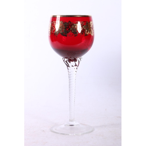 77 - Six ruby glass hock glasses decorated with gold printed grape & vine design.