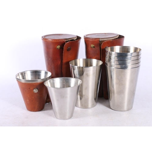 9 - Three graduated leather cased sets of beakers, a continental style plate decorated with a bird, and ... 