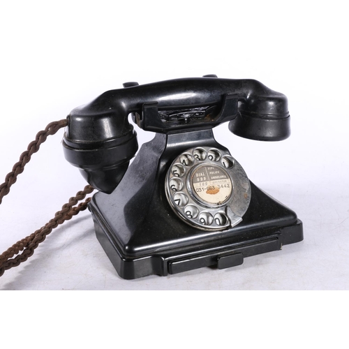 98 - Vintage black telephone.