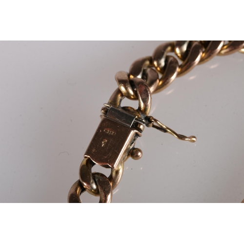 101 - 8ct gold curb link bracelet set with diamond chips, the clasp stamped '333',12.4g gross. 