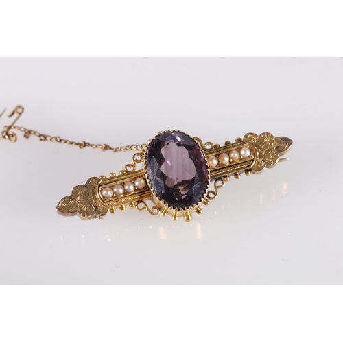 113 - Victorian yellow metal brooch set with large faceted oval amethyst and seed pearls, no markings, 9.8... 