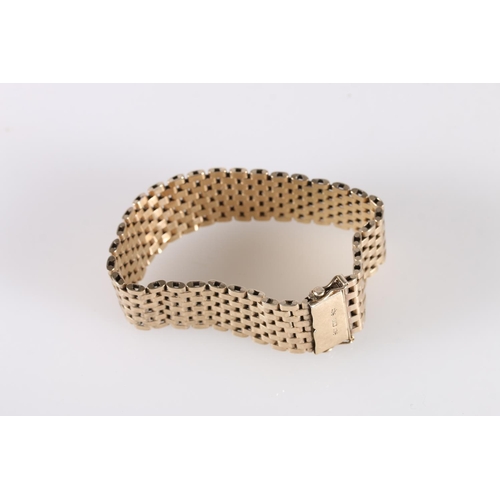 119 - 9ct yellow gold strap bracelet, makers mark 'C&F', 39g.