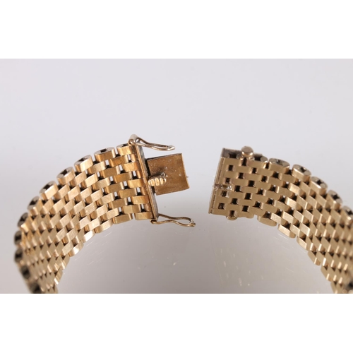 119 - 9ct yellow gold strap bracelet, makers mark 'C&F', 39g.