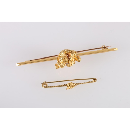 124 - Raw gold nugget set onto a knife edge bar brooch, unhallmarked, 16.2g gross and another smaller, 1g.... 