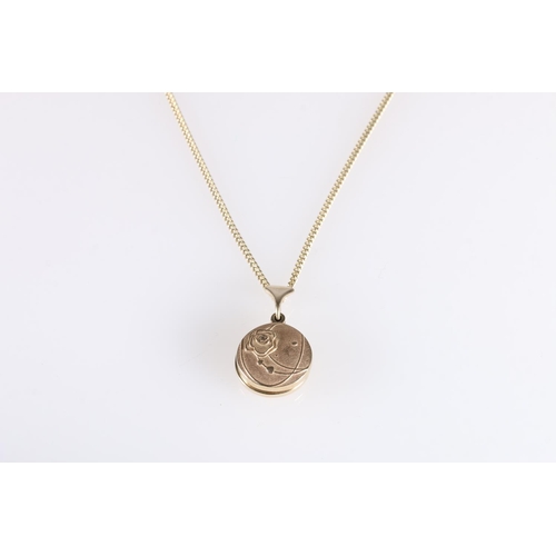 158 - 9ct gold photo locket with foliate design to one side, on 9ct gold chain, 16g gross. 