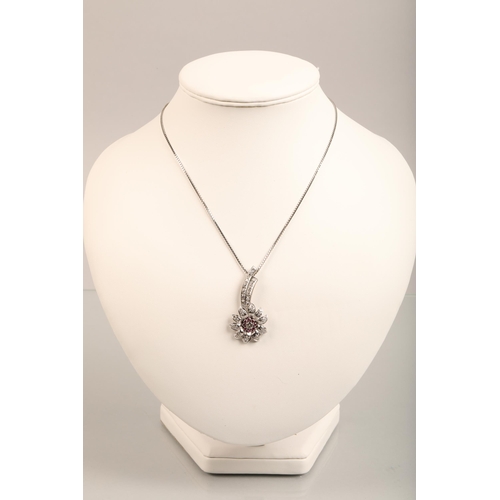 71 - Ladies diamond & ruby floral spray pendant, central stone 0.25 carat surrounded by eight smaller... 