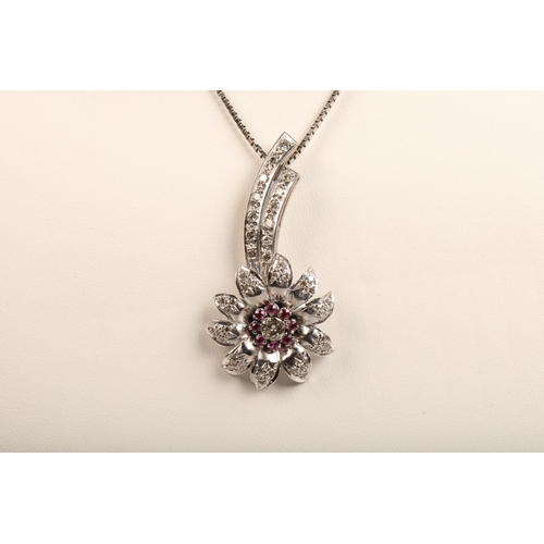 71 - Ladies diamond & ruby floral spray pendant, central stone 0.25 carat surrounded by eight smaller... 