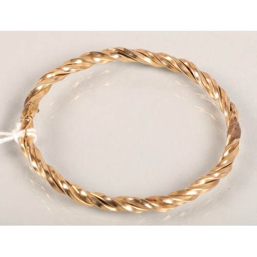 76 - 9ct gold bangle 14.2g