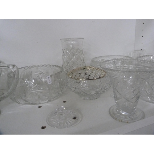 107 - Collection of cut and other glass including jugs, vases, bowls etc (one shelf).