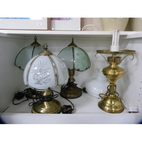 110 - Pair of table lamps and two others (one shelf).