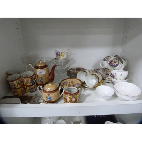 111 - Oriental-style coffee set, floral decorated part tea set, cut glass etc (one shelf).