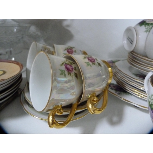 111 - Oriental-style coffee set, floral decorated part tea set, cut glass etc (one shelf).