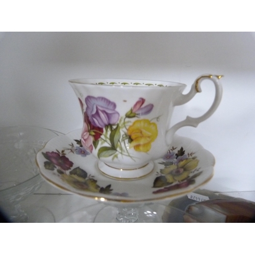 111 - Oriental-style coffee set, floral decorated part tea set, cut glass etc (one shelf).