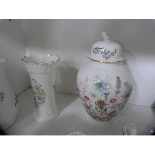 112 - Collection of various Aynsley items to include two teddy bears, flower vases, jardinière etc (one sh... 