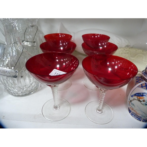 115 - Four various cut glass decanters with labels, cut glass water jug, vases, pair of small oriental gin... 