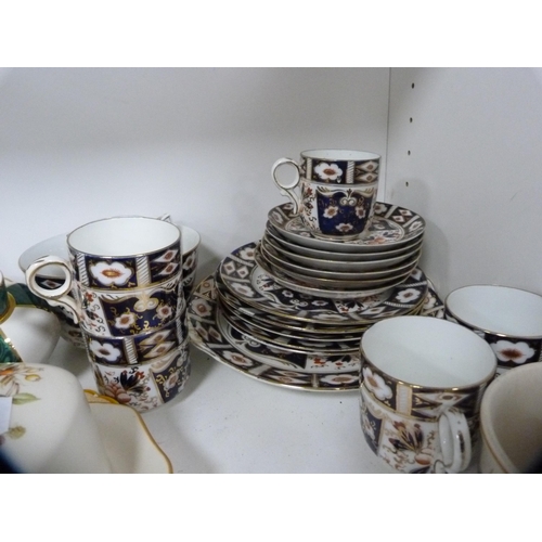 125 - Decorative ceramics to include an Imari pattern tea set, model pig, pair of thistle vases, Aynsley b... 