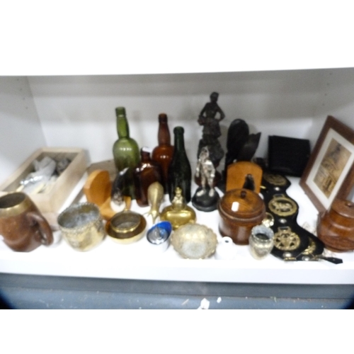 129 - Horse brasses, metalware, antique-type bottles, oak tankard etc (one shelf).