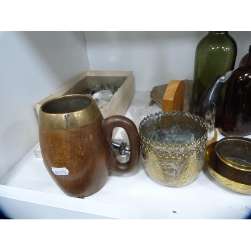 129 - Horse brasses, metalware, antique-type bottles, oak tankard etc (one shelf).