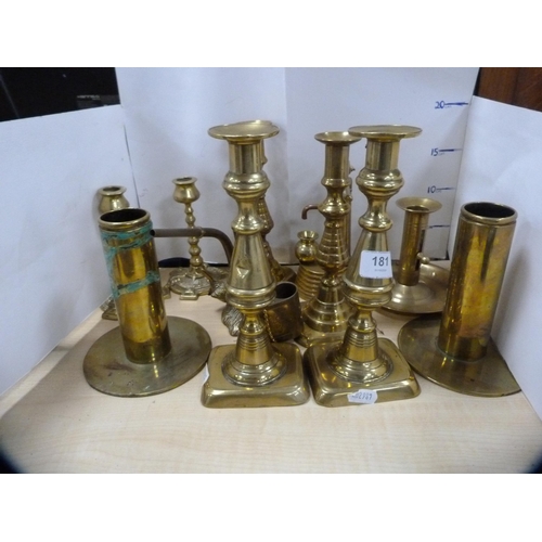 181 - Collection of brassware to include three pairs of candlesticks, chambersticks etc.