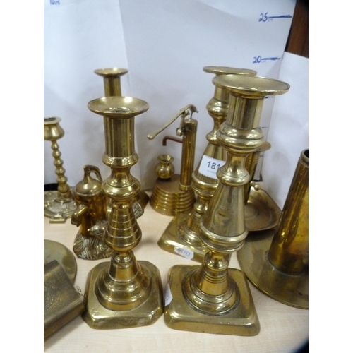 181 - Collection of brassware to include three pairs of candlesticks, chambersticks etc.