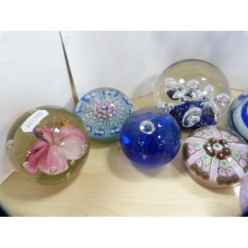 184 - Collection of various paperweights and a blue coloured vase.