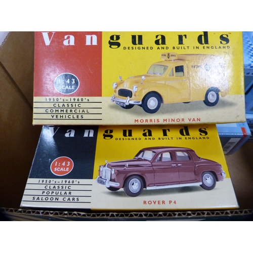 194 - Carton containing Vanguards diecast vehicles to include police vehicles, 1950s/60s saloon cars, vans... 