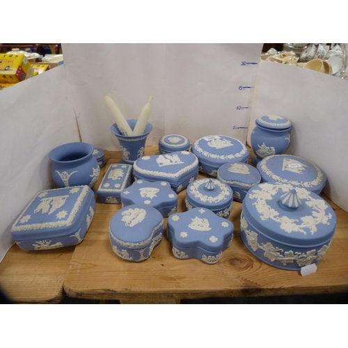 198 - Collection of Wedgwood blue Jasper ware to include trinket boxes and covers, spill vases etc.