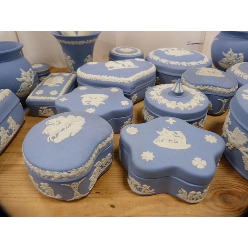 198 - Collection of Wedgwood blue Jasper ware to include trinket boxes and covers, spill vases etc.