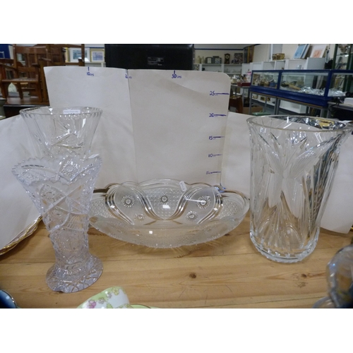 199 - Four pieces of cut glass and crystal to include vases and a shaped bowl.  (4)