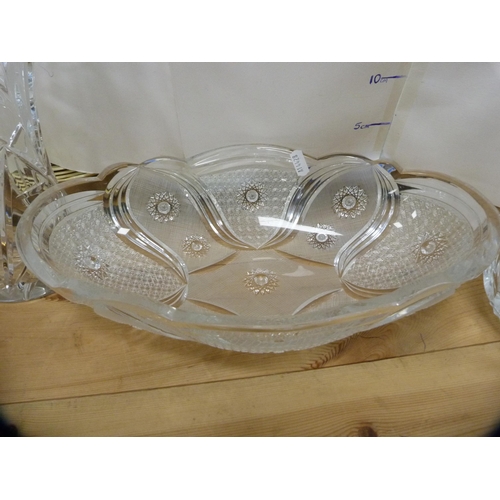 199 - Four pieces of cut glass and crystal to include vases and a shaped bowl.  (4)