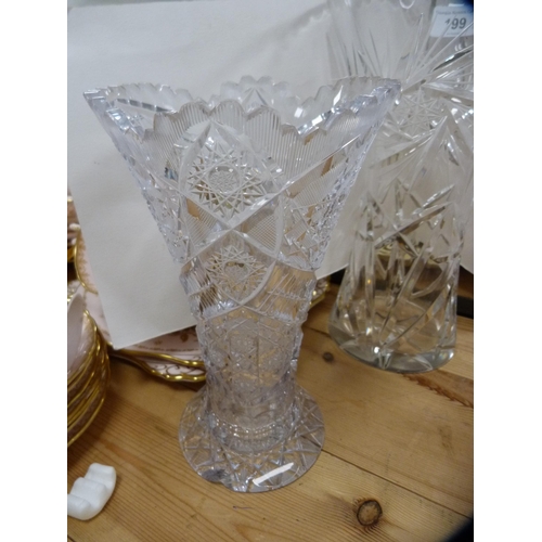 199 - Four pieces of cut glass and crystal to include vases and a shaped bowl.  (4)