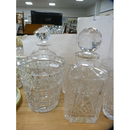 202 - Crystal and glassware to include three assorted decanters, vases and tumblers.  (13)