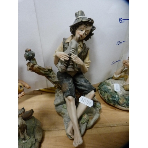 203 - Collection of modern Capodimonte figures, mainly modelled as beggars, assorted sizes, and a Capodimo... 