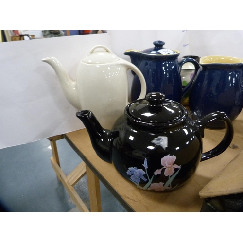 205 - Collection of assorted glazed teapots and jugs to include a Denby blue glazed jug etc.