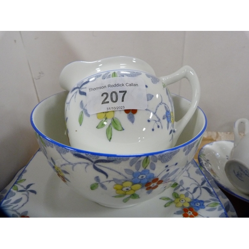 207 - Sutherland China floral decorated part tea set.