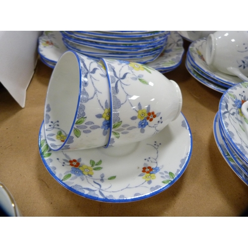 207 - Sutherland China floral decorated part tea set.