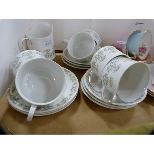 211 - Paragon 'Fiona' pattern part tea set and an Aynsley harlequin-coloured part tea set.