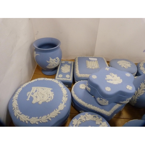 219 - Collection of Wedgwood blue Jasper ware to include trinket jars, vases etc.