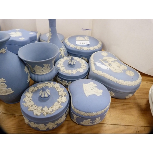 219 - Collection of Wedgwood blue Jasper ware to include trinket jars, vases etc.