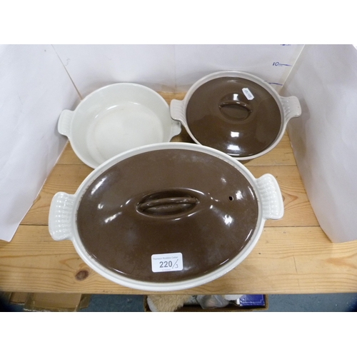 220 - Three assorted Cousances casserole dishes, two with covers.  (3)