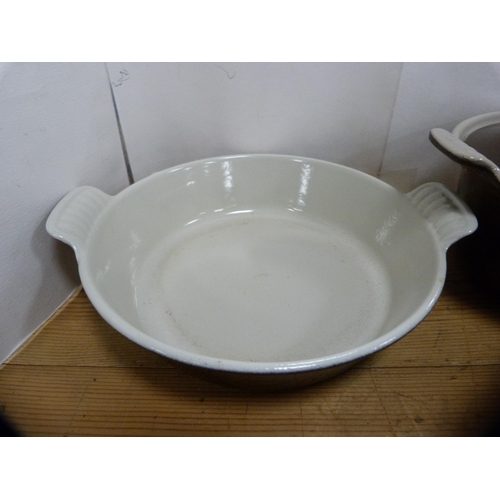 220 - Three assorted Cousances casserole dishes, two with covers.  (3)