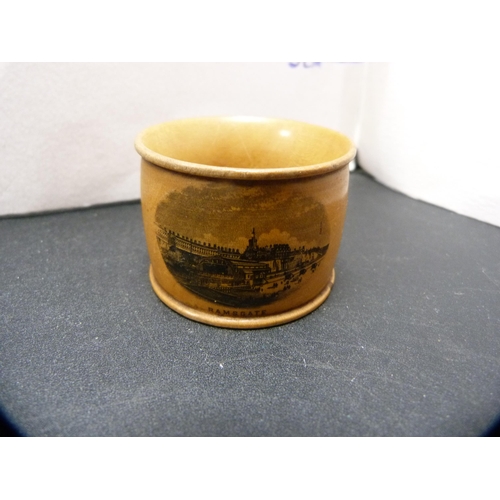 240 - Group of Poole Pottery, stamped to the underside, Mauchline ware napkin ring depicting Ramsgate, and... 