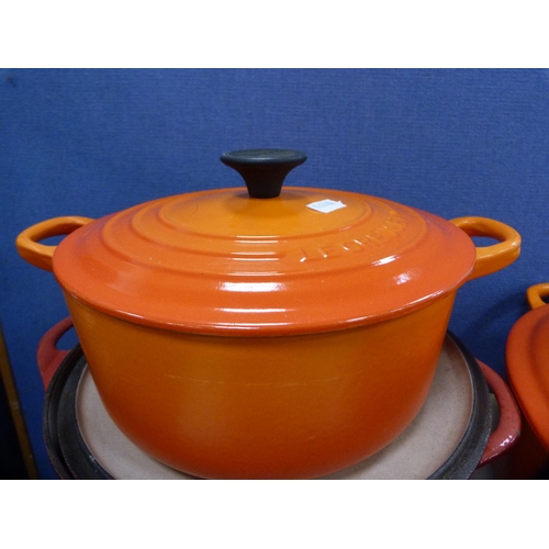 34 - Three Le Creuset casseroles.